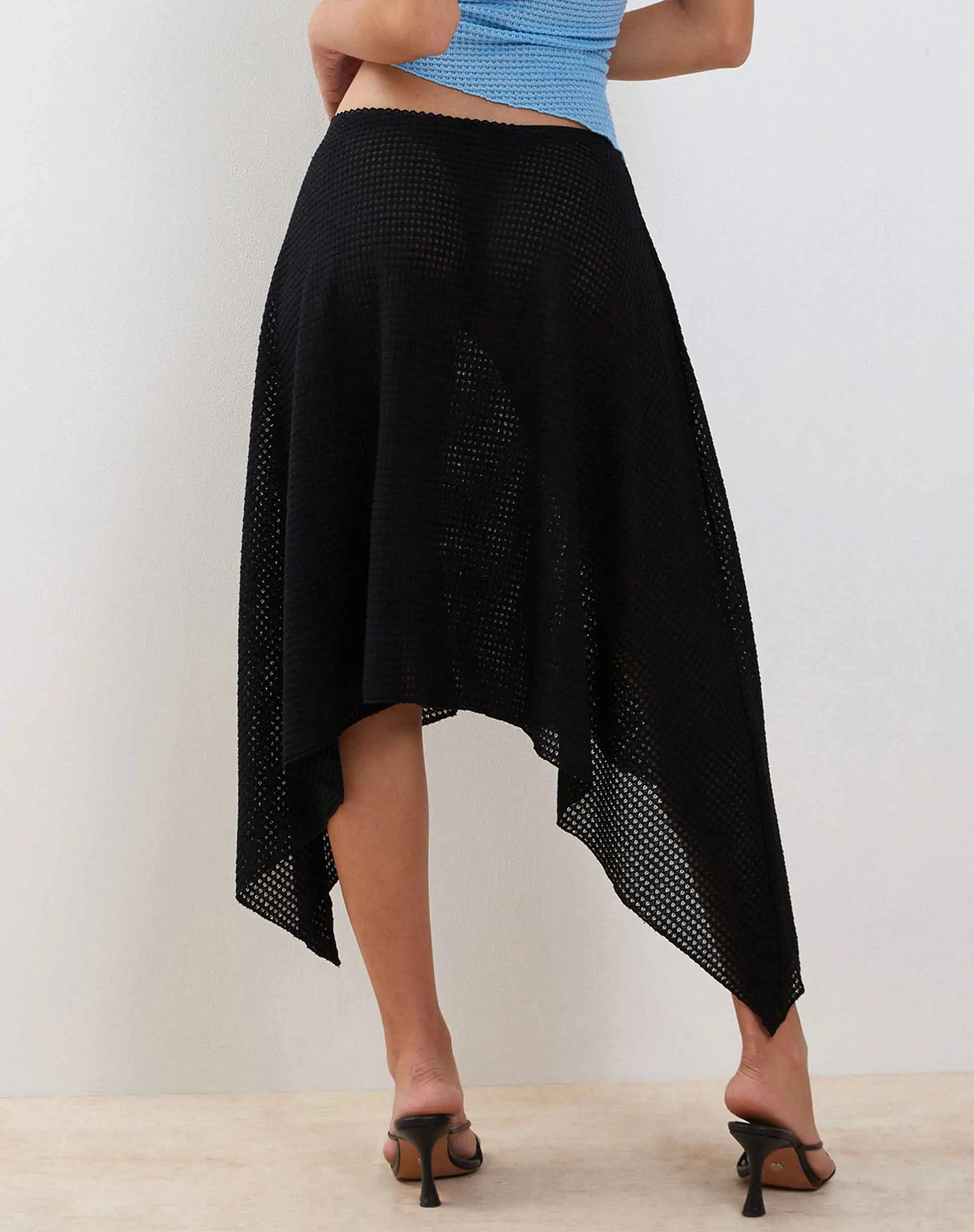 Tullia Asymmetric Midi Skirt in Black Crochet